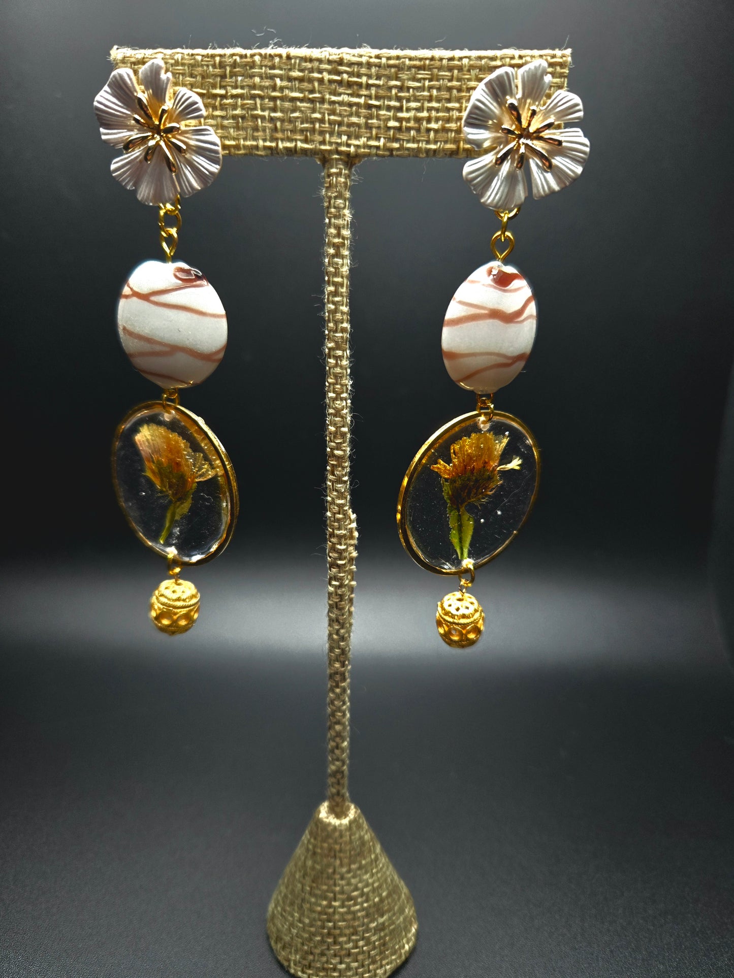 Long dangle earrings.